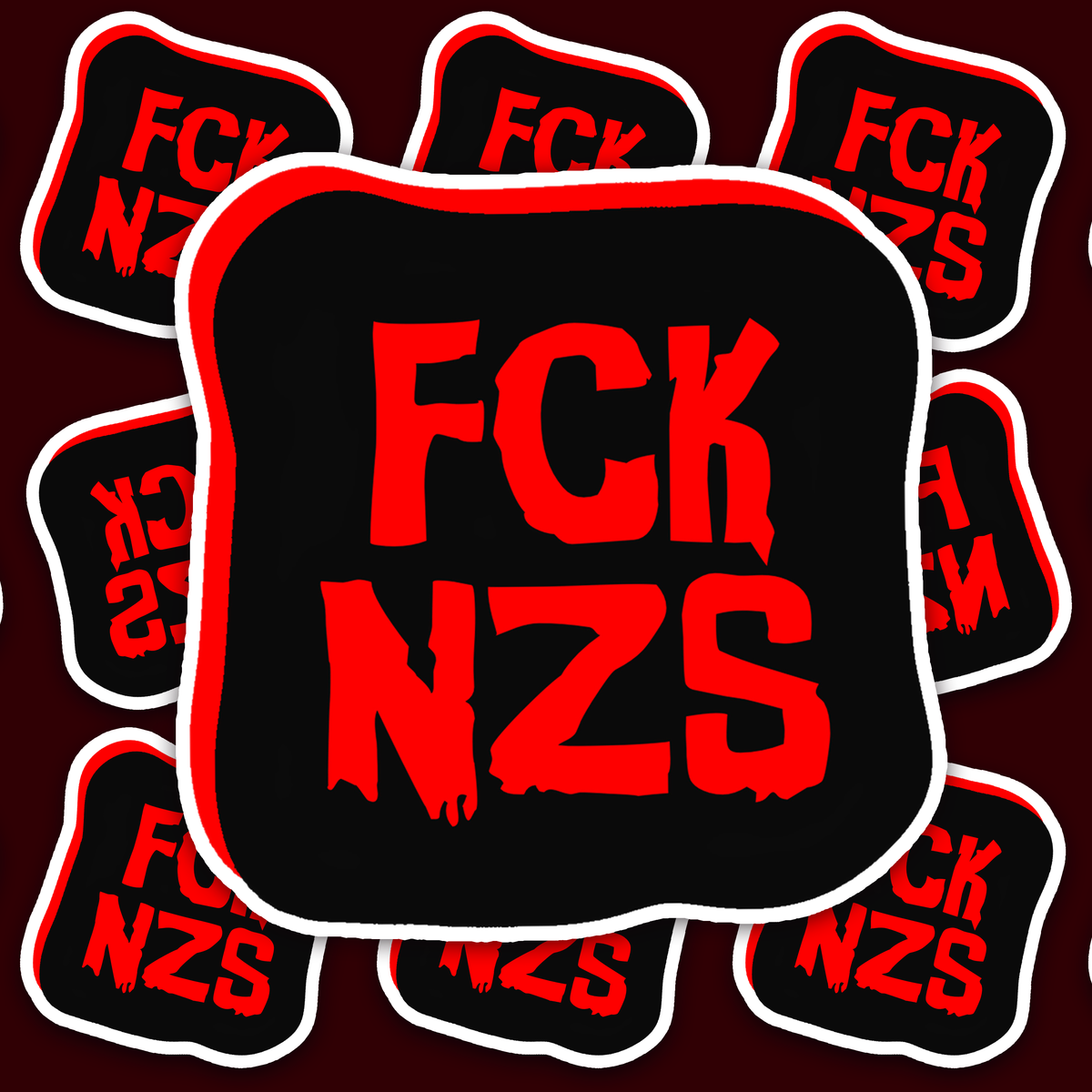 Black sticker with a red border and distressed red text reading FCK NZS.