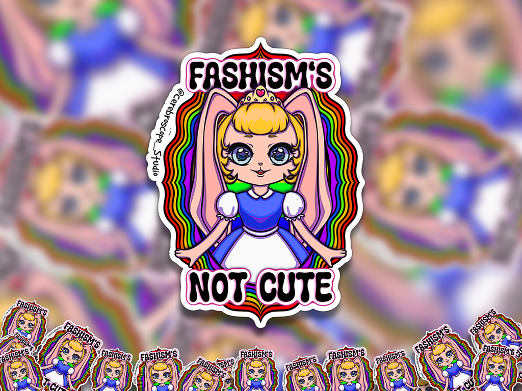Alternate mockup 2: Pastel fantasy character with large pink ears surrounded by rainbow colors and the words Fascism’s Not Cute.