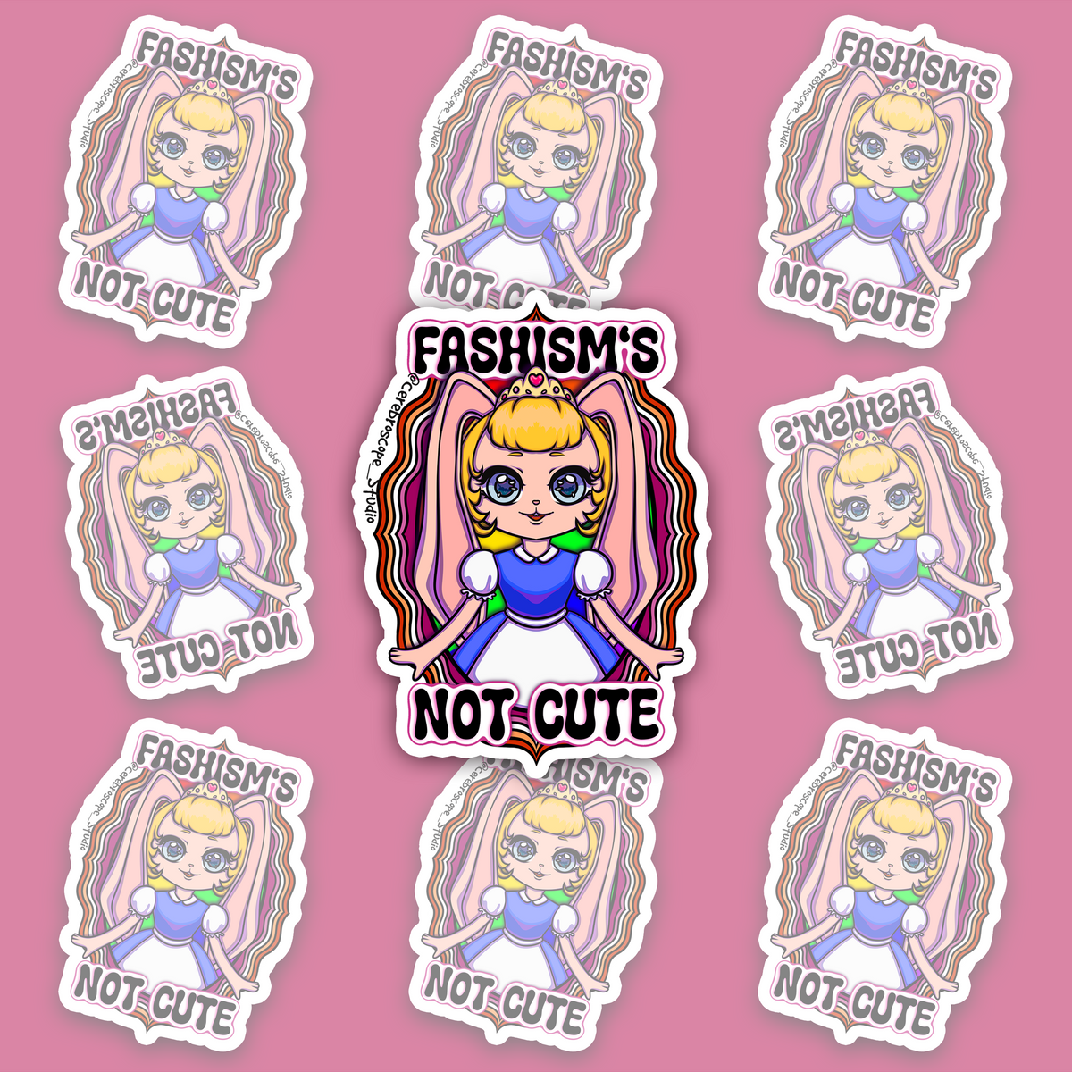 Pastel fantasy character framed by orange, pink and rose Lesbian Pride colors with the words Fascism’s Not Cute.