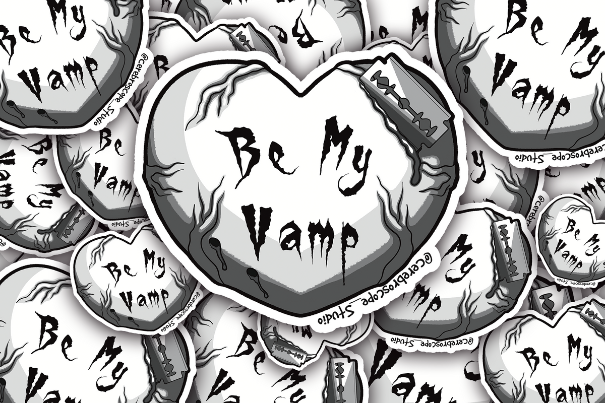 Alternate mockup 3: Pale heart with dark vein-like details, gothic text reading Be My Vamp, and a razor blade actively cutting into the upper edge.