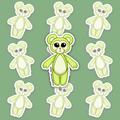Lime-green teddy bear with rounded ears, large dark glossy eyes, a pink nose and pale panels on the face, muzzle, inner ears and belly.