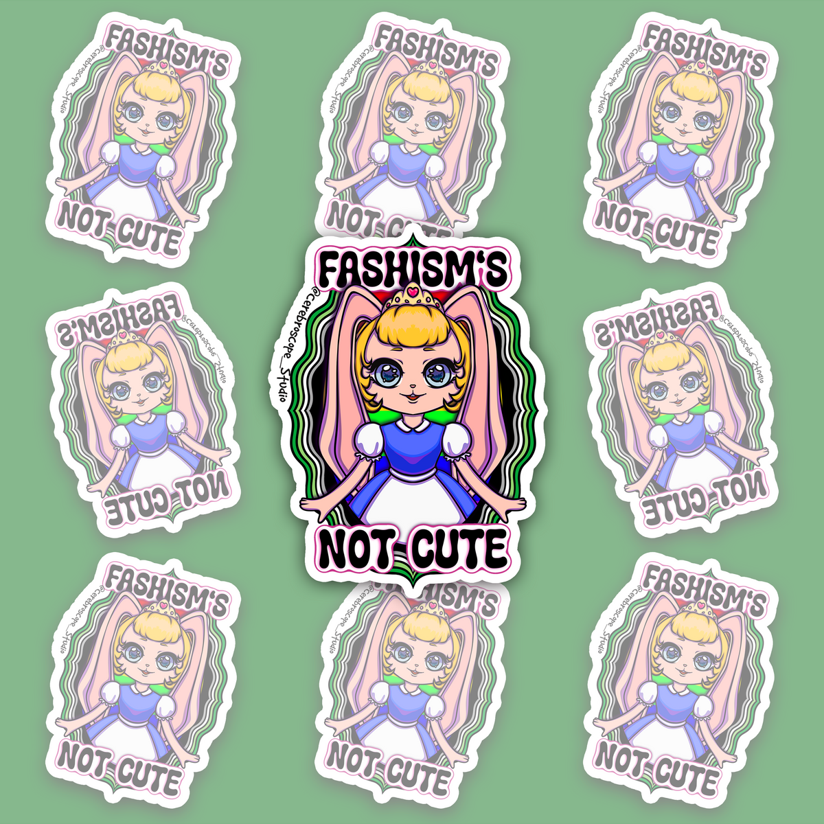 Crowned blonde character with pink bunny ears and a blue-and-white dress, surrounded by wavy green, white, grey and black bands and “FASHISM’S NOT CUTE” lettering.