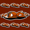 Sleeping calico cat stretched flat with orange, white and dark coat patches.