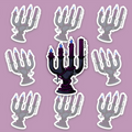 Black gothic candelabra with purple candles, blue flames, purple beads and hanging crosses.